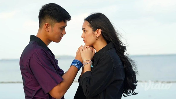 Theo and Ruza share an emotional moment by the sea in "Theo & Ruza".